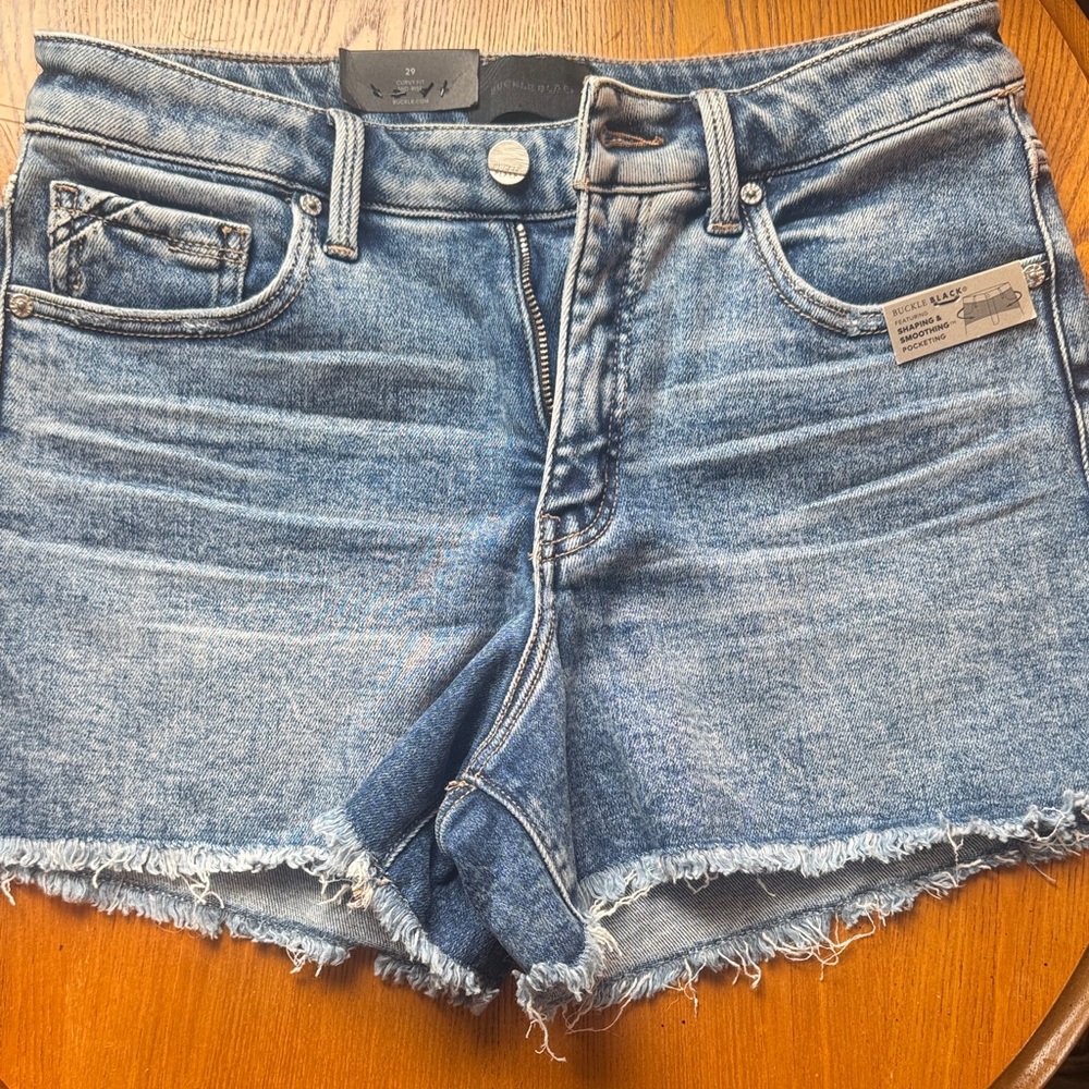 Buckle Distressed Blue Jean Shorts